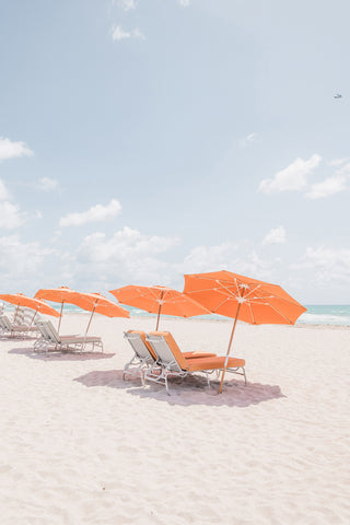 Orange Parasols on the Beach